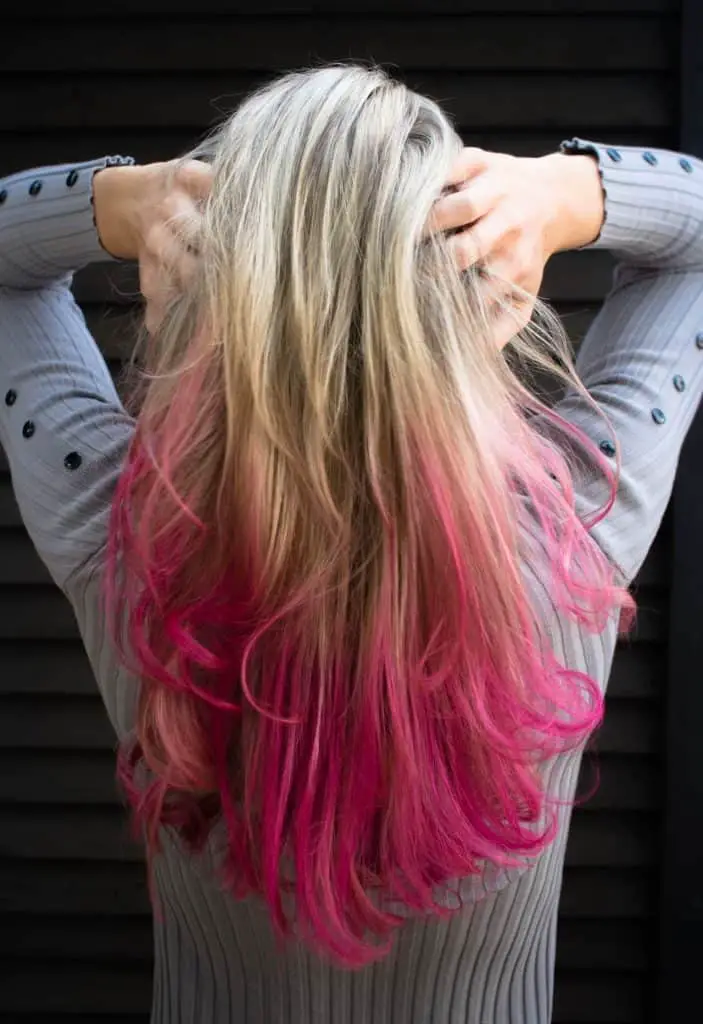 Woman with blonde and pink hair