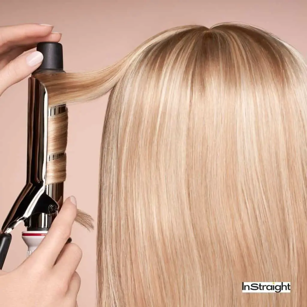photo of a straight hair beside a curling iron but Can You Straighten Your Hair With a Curling Iron?