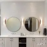 two round mirrors beside How to remove bathroom mirror signage