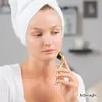 pretty lady using a derma roller on her face but How often to use derma roller?