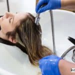lady getting her hair washed in a salon