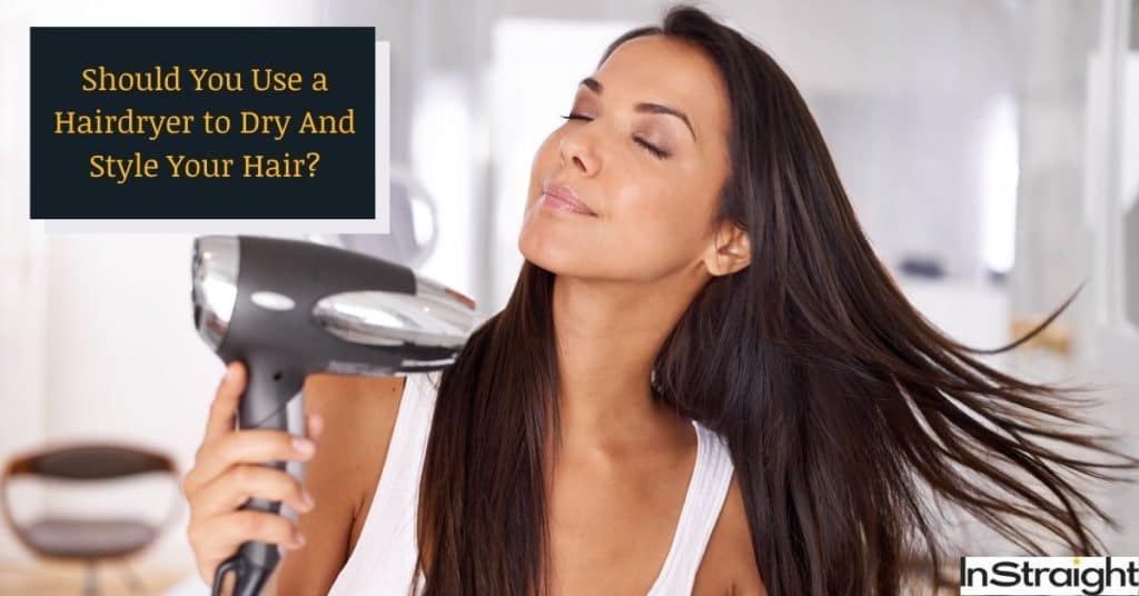 lady blow drying her hair but should we use a hairdryer?