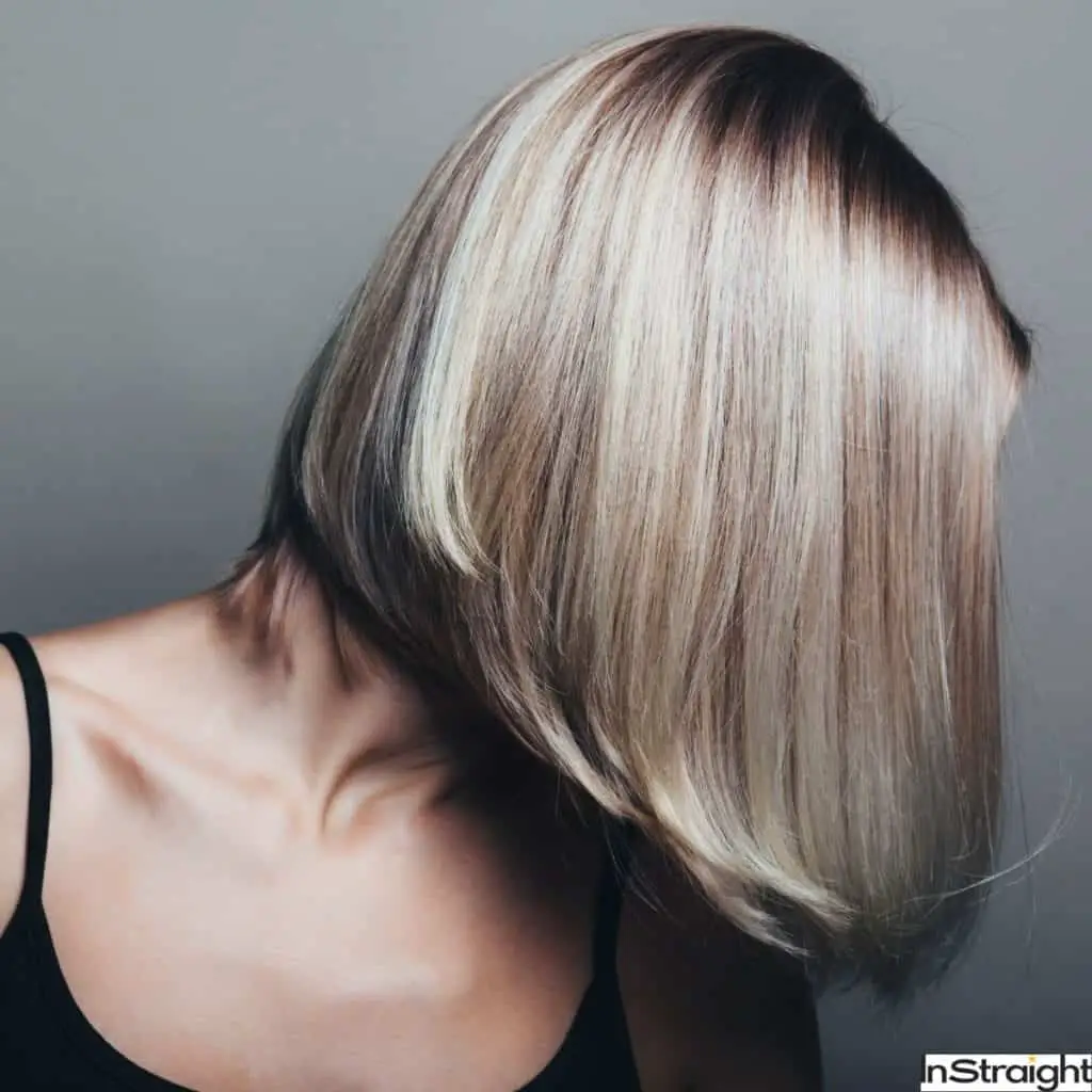 blonde woman with a sliced bob haircut