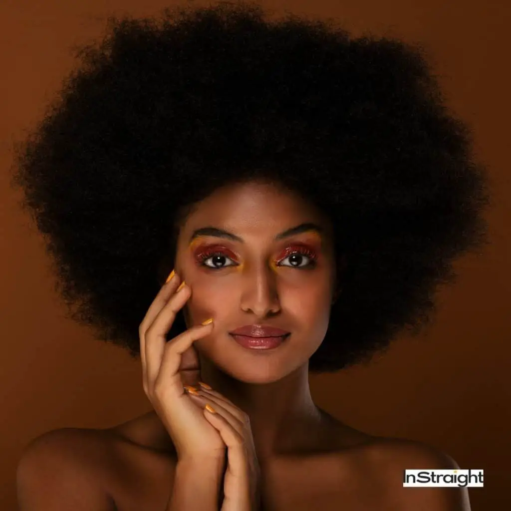 gorgeous lady with Afro hair but How to blow dry black hair flawlessly?