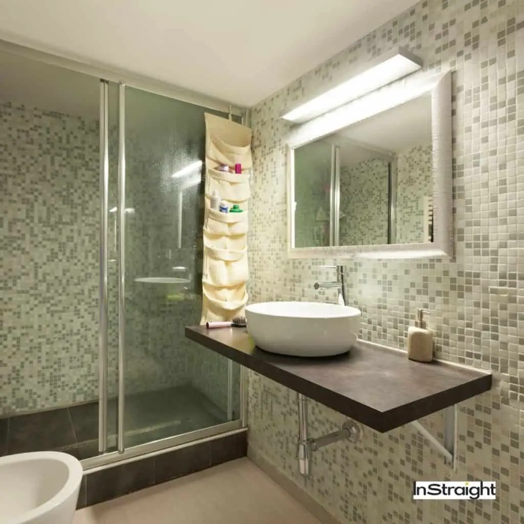 big bathroom mirror beside a shower