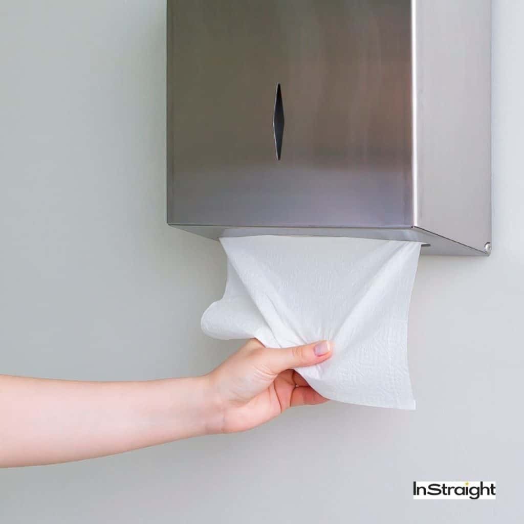 hand getting a paper towel