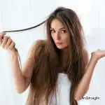 woman showing the difference between dry and damaged hair