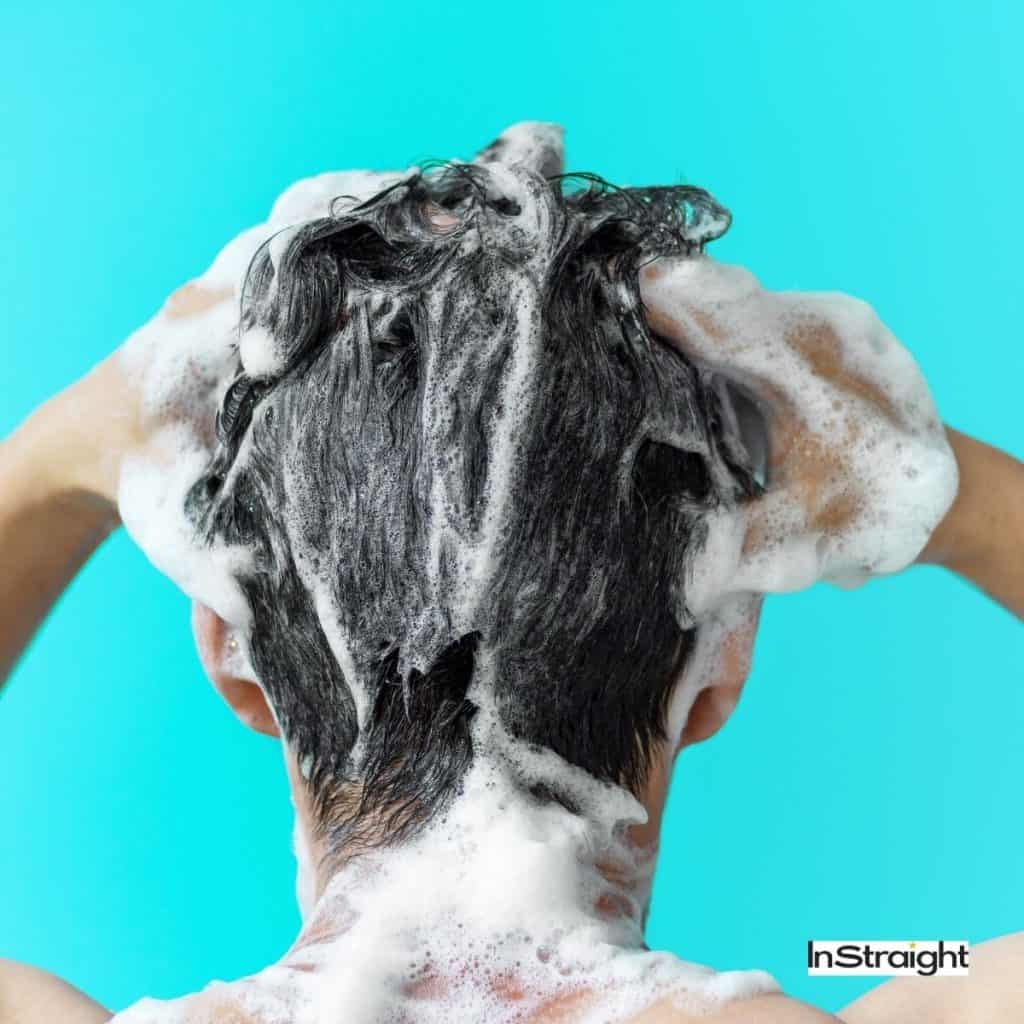 guy shampooing his hair