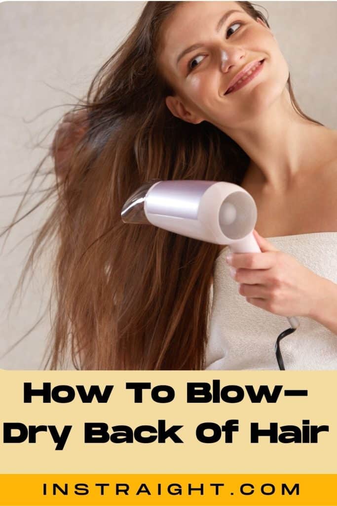 woman in a towel blowdrying back of the hair under title How To Blow-Dry Back Of Hair In 6 Steps