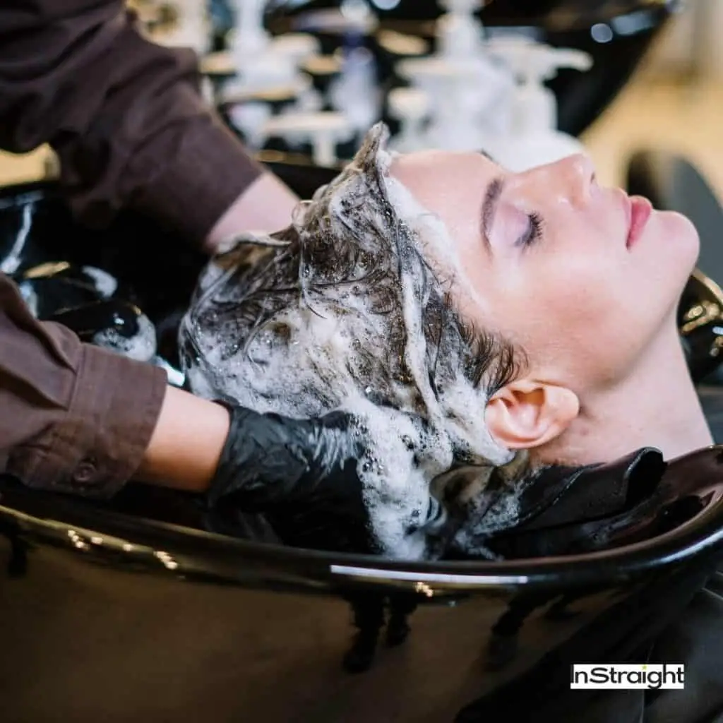 A lady being washed hair at the salon