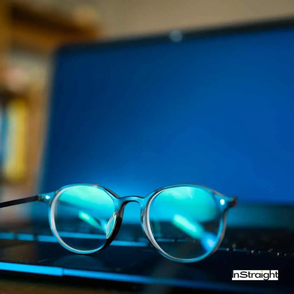 anti glare glasses on top of a laptop keyboard