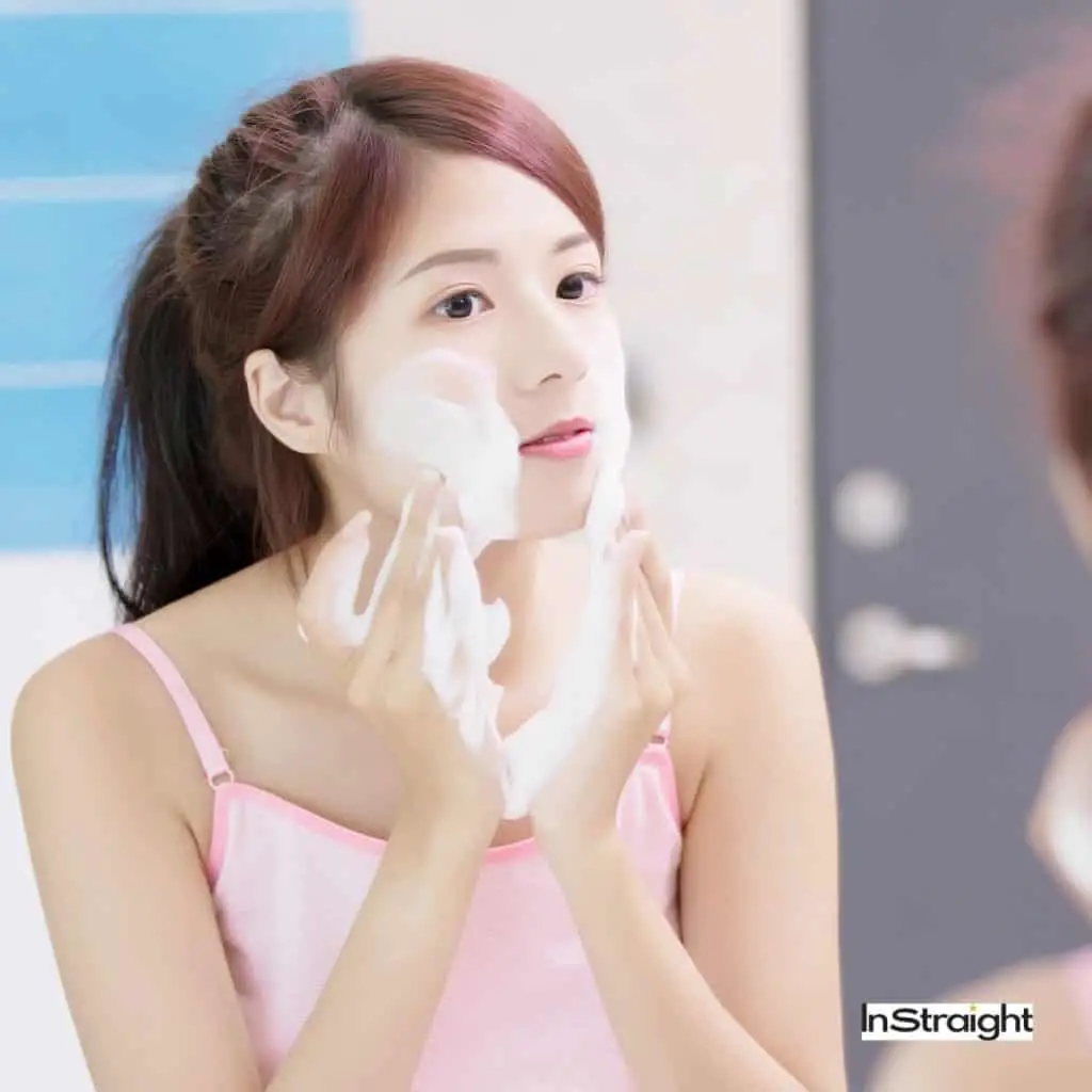 Korean lady washing her face