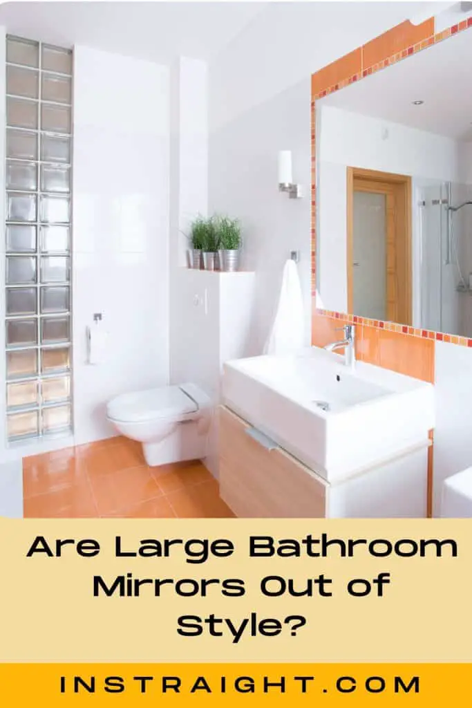 A large wall mirror under title are large bathroom mirrors out of style?