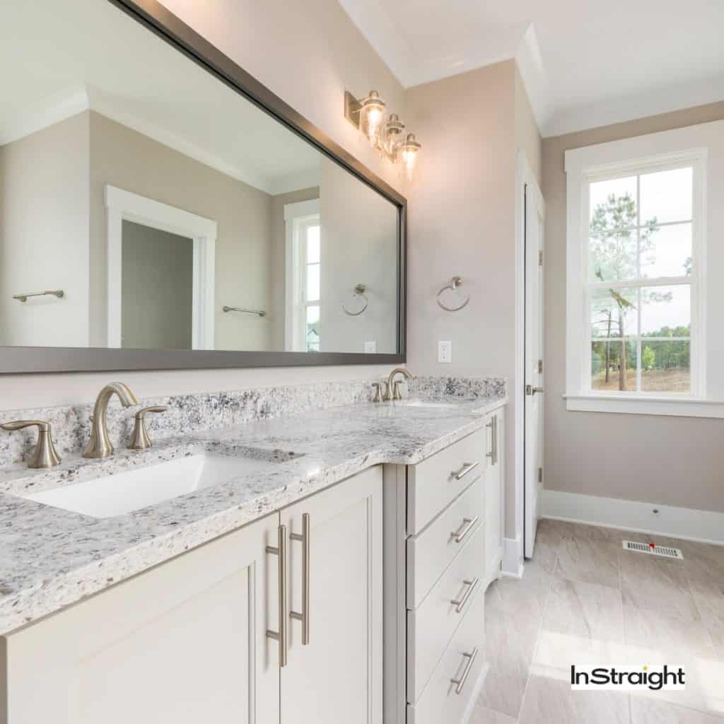 A large bathroom mirror under title are large bathroom mirrors out of style?