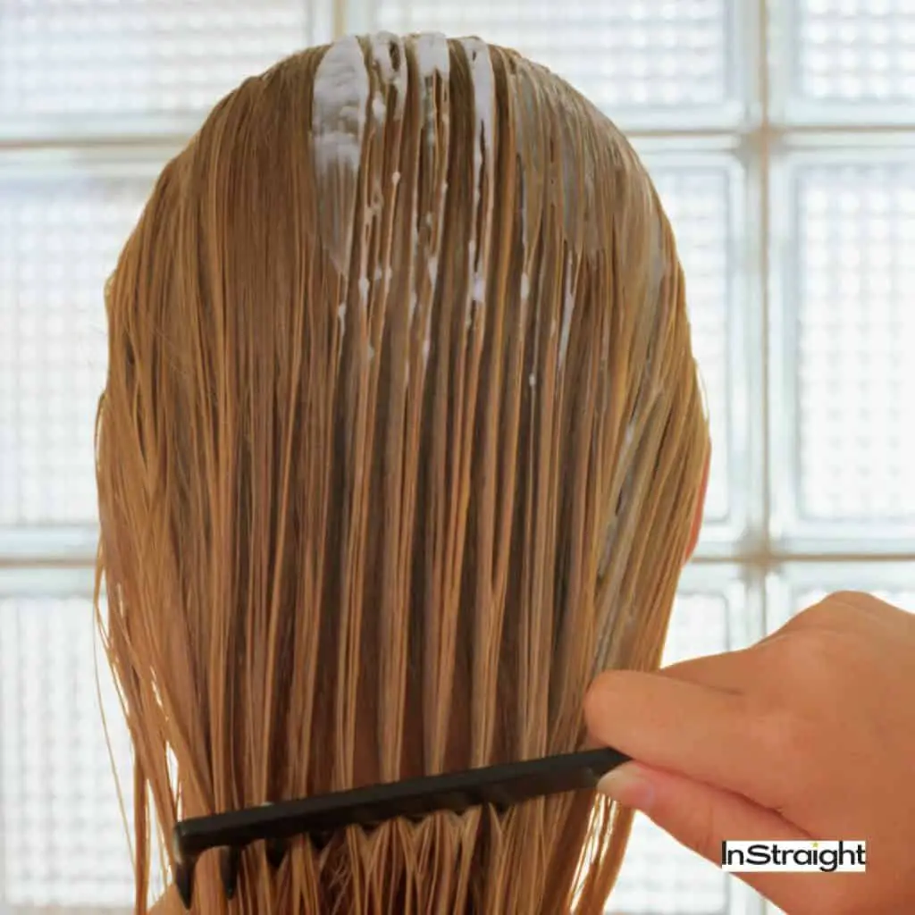 brushing hair while conditioning