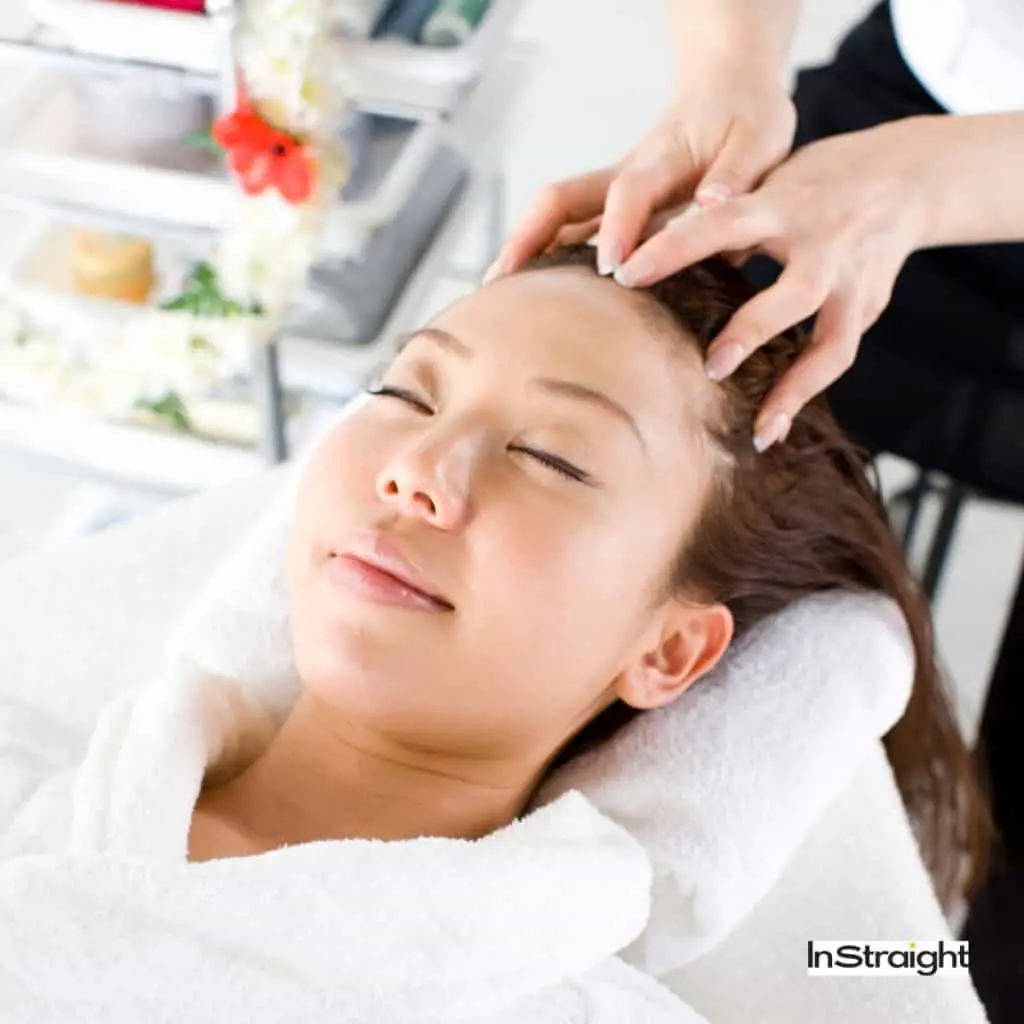 lady getting a scalp massage