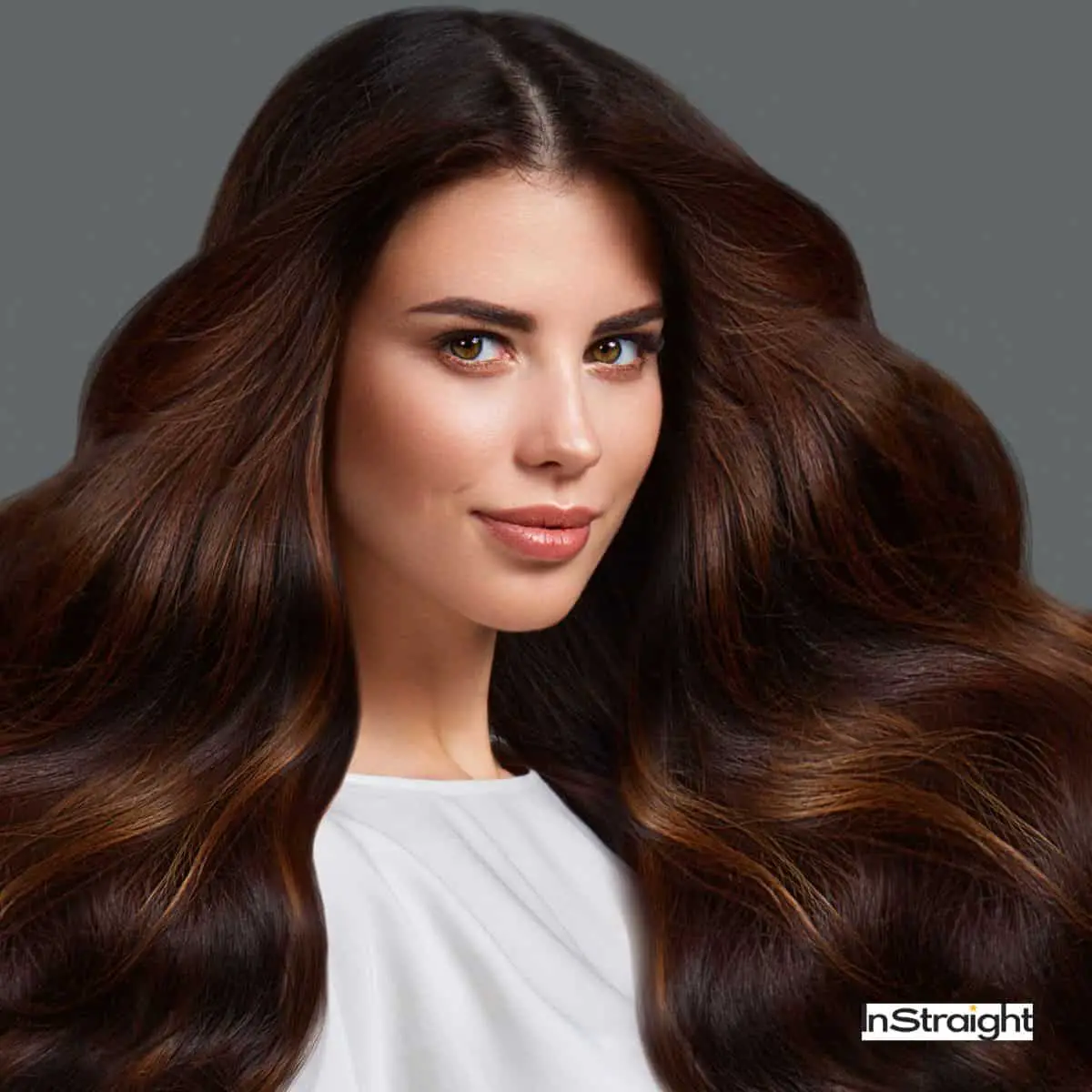 woman with beautiful bouncy hair after keratin treatment (Keratin Express vs. Keratin Treatments)