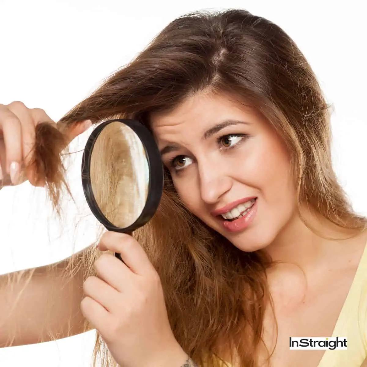 women checking whether heat-damaged hair vs healthy hair she is